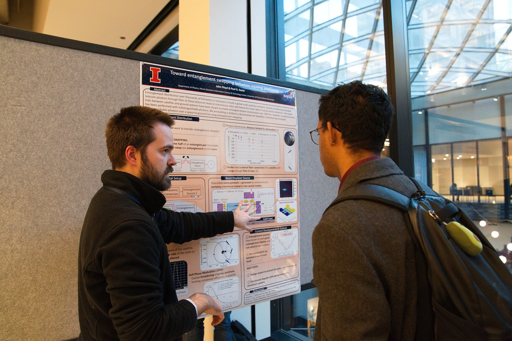 John Floyd presents his poster on quantum networking.