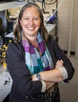 Elizabeth Goldschmidt standing in her lab