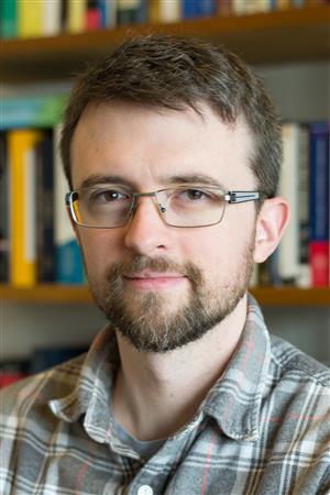 A professional photo of Patrick Draper.