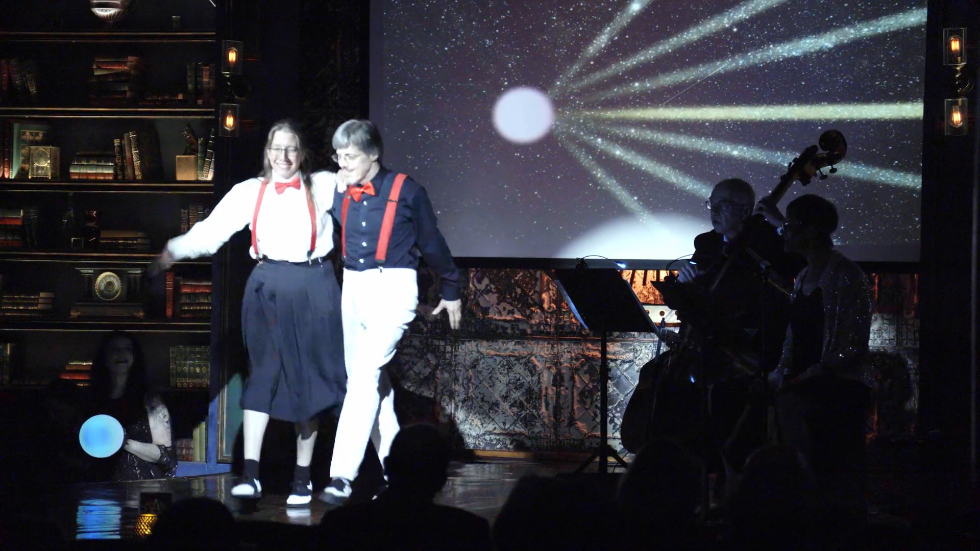 A man and a woman doing swing dancing