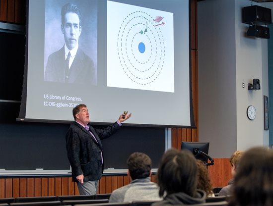 Guest speaker Chad Orzel addresses World Quantum Day attendees. (Credit: Heather Coit | Grainger College of Engineering)
